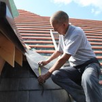 Mick working on a Roof